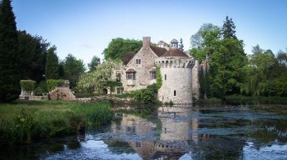 View of Scotney Castle over the lake